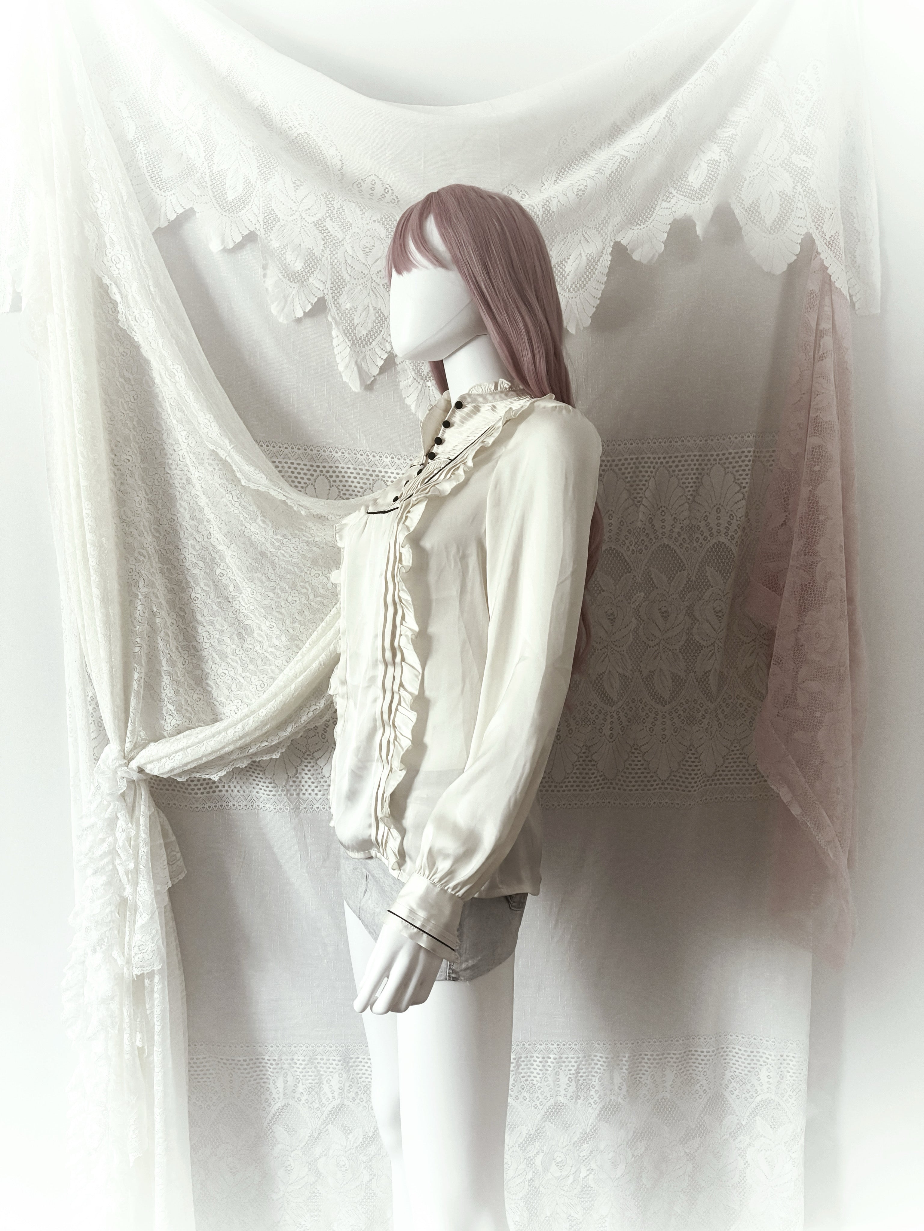 Lolita cream silky blouse with ruffle details and button-up front