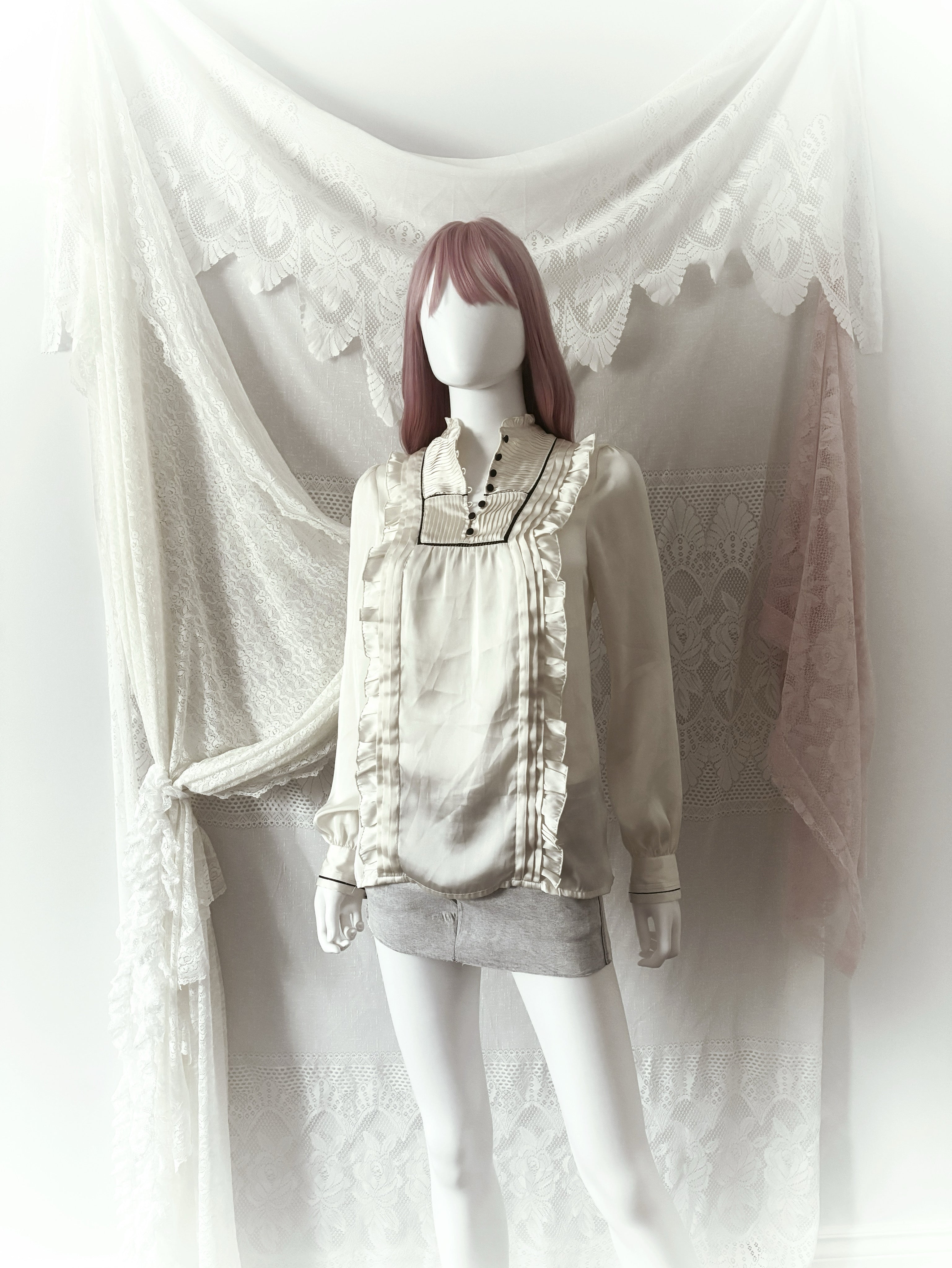 Lolita cream silky blouse with ruffle details and button-up front