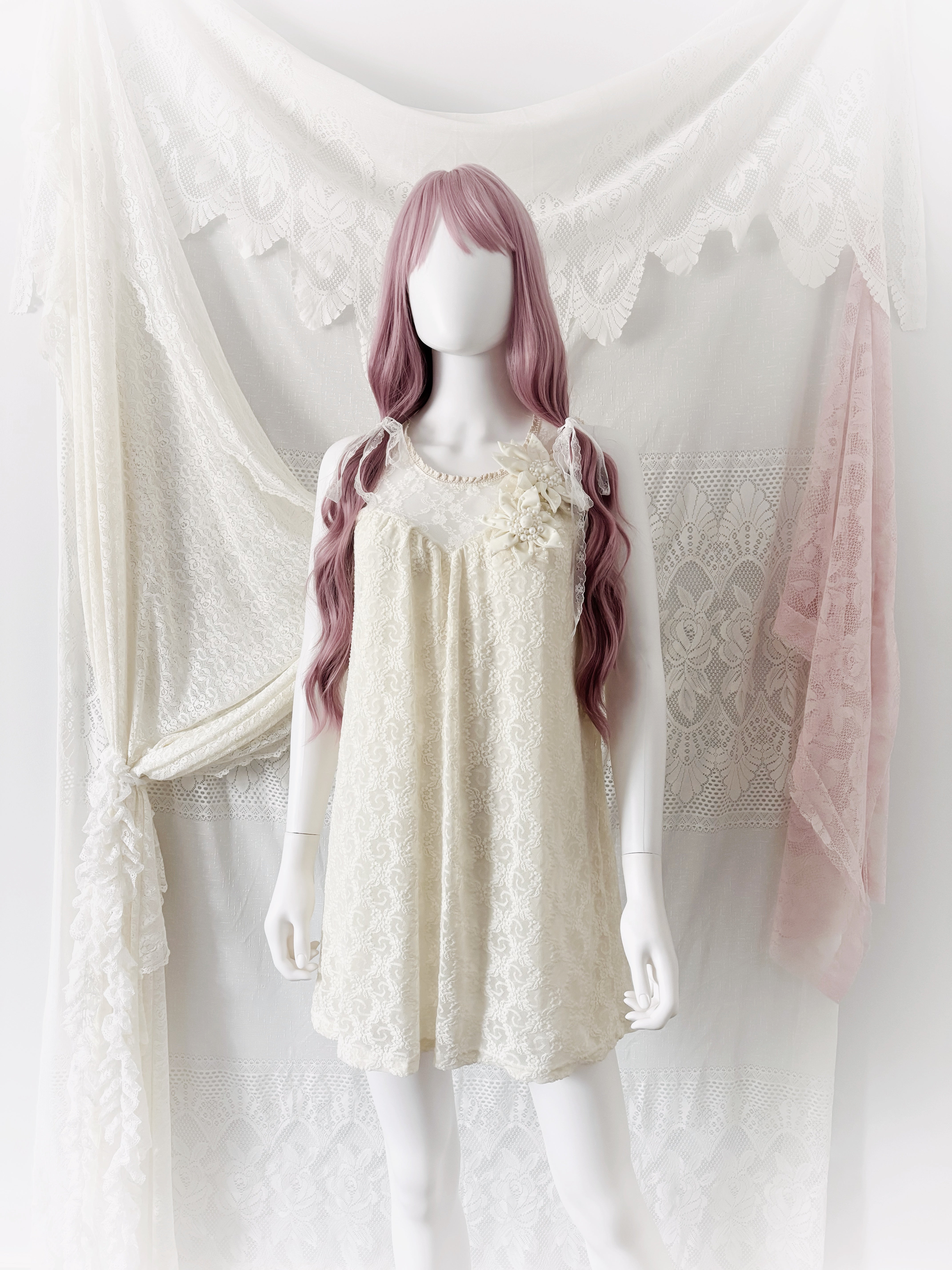 Cream lace baby doll dress with floral and pearl details