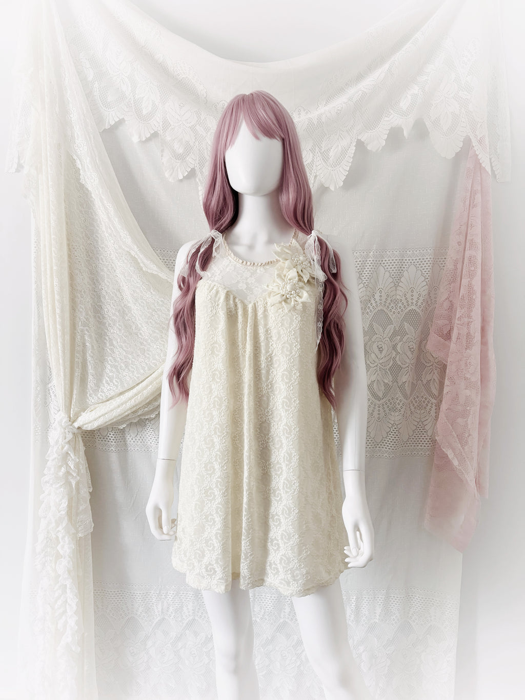 Cream lace baby doll dress with floral and pearl details