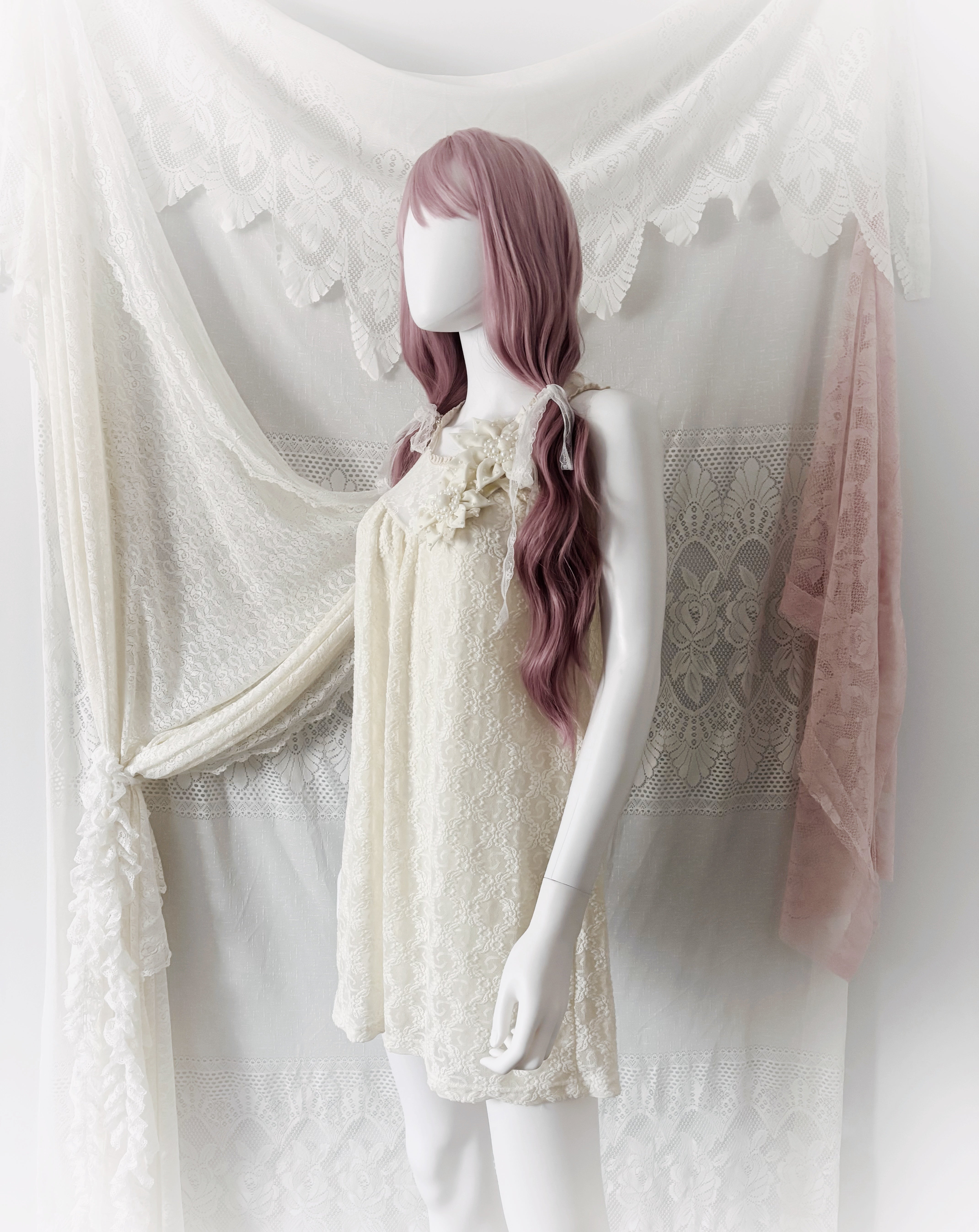 Cream lace baby doll dress with floral and pearl details