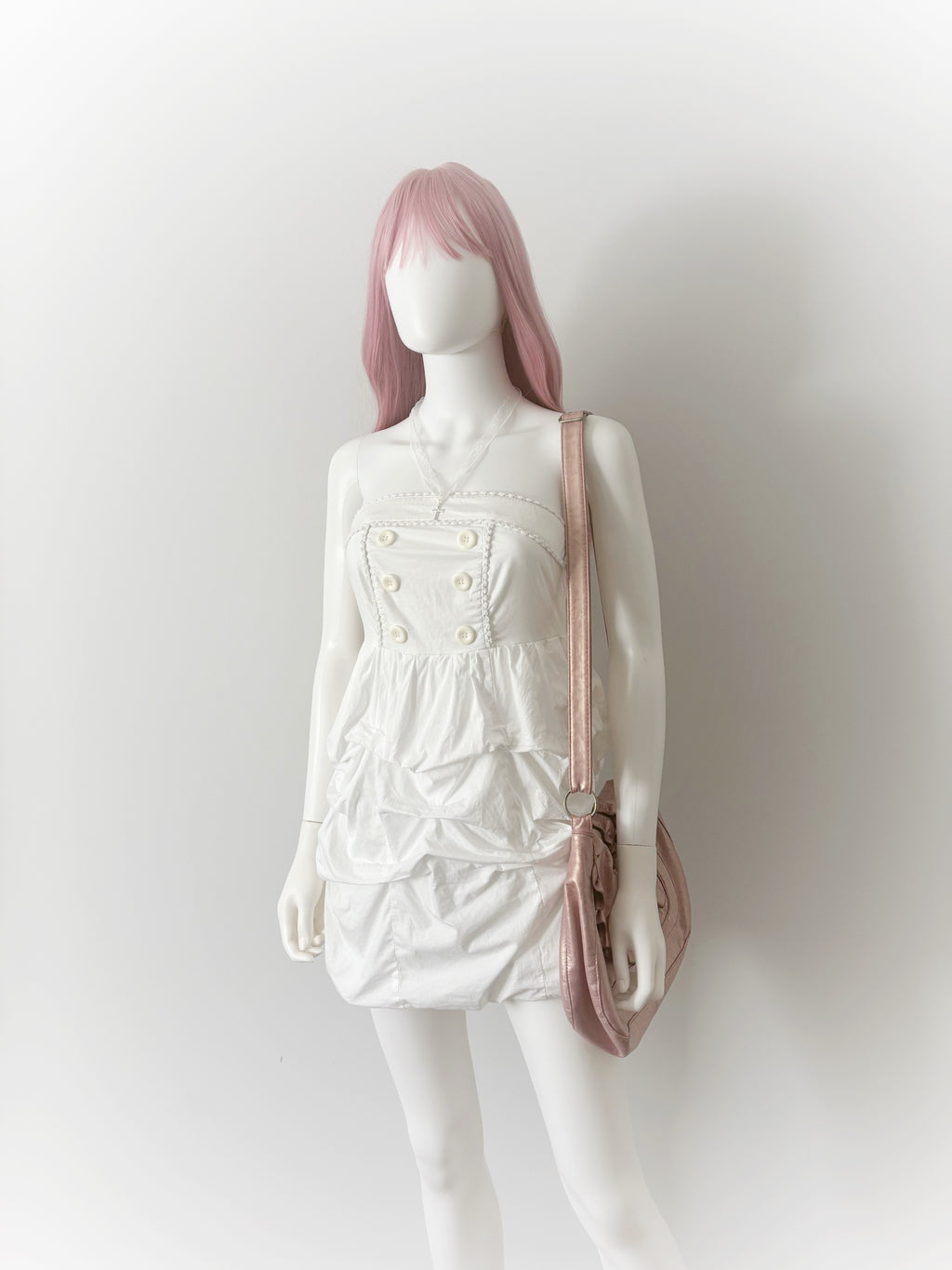 White bubble dress with cute button detail and ruched skirt